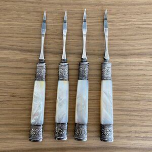 Four Vintage Nut Picks with Mother of Pearl Handles